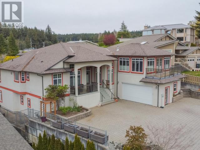 6929 Retaskit Crt, House detached with 5 bedrooms, 4 bathrooms and 2 parking in Powell River BC | Image 50