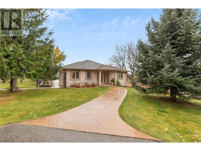 5731 Anderson Road, House detached with 4 bedrooms, 4 bathrooms and 11 parking in Central Okanagan BC | Image 2