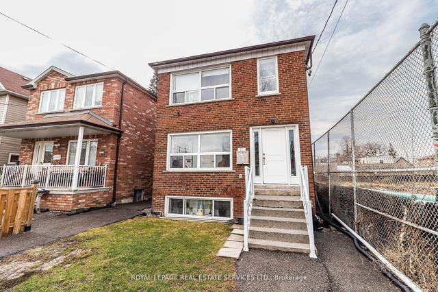 11 Dennis Ave, House detached with 4 bedrooms, 3 bathrooms and 2 parking in Toronto ON | Image 1
