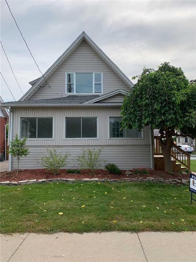 14 Victoria Ave N, House detached with 3 bedrooms, 2 bathrooms and 4 parking in Leamington ON | Image 1