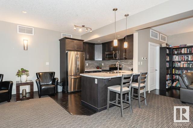 103 - 6083 Maynard Wy Nw, Condo with 1 bedrooms, 1 bathrooms and 1 parking in Edmonton AB | Image 36