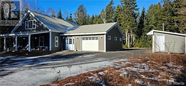 27 Woodland Road, House detached with 2 bedrooms, 1 bathrooms and null parking in Pennfield NB | Image 1