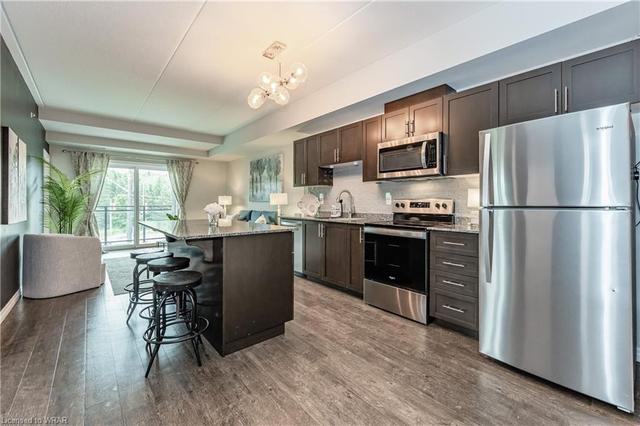 308 - 35 Kingsbury Square, House attached with 2 bedrooms, 2 bathrooms and 1 parking in Guelph ON | Image 1