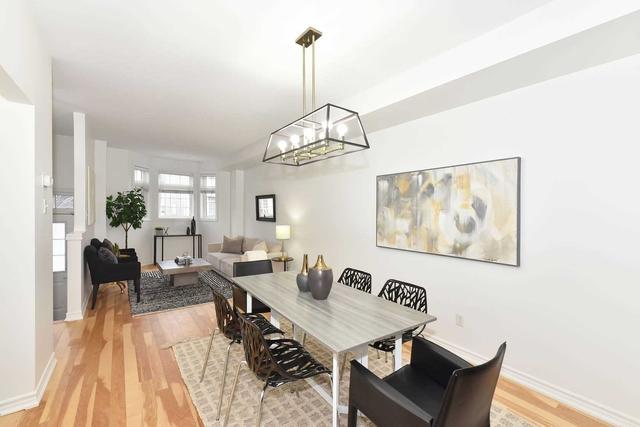 18 Piggot Mews, House attached with 3 bedrooms, 2 bathrooms and 2 parking in Toronto ON | Image 2