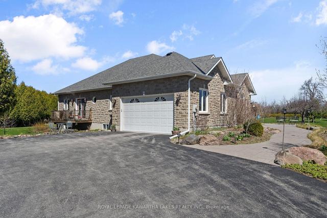 1407 Tracey's Hill Rd, Home with 2 bedrooms, 4 bathrooms and 21.5 parking in Kawartha Lakes ON | Image 2