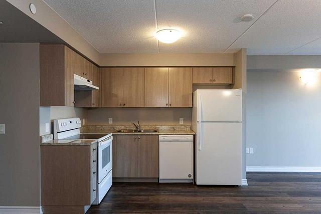 407 - 716 Main St E, Condo with 2 bedrooms, 2 bathrooms and 1 parking in Milton ON | Image 38