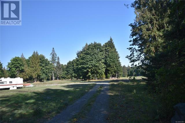 8991 Island Hwy S, House detached with 2 bedrooms, 1 bathrooms and 10 parking in Comox Valley A BC | Image 47