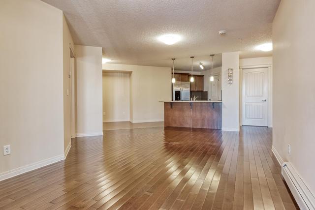 2212 - 175 Panatella Hill Nw, Condo with 2 bedrooms, 2 bathrooms and 1 parking in Calgary AB | Image 3