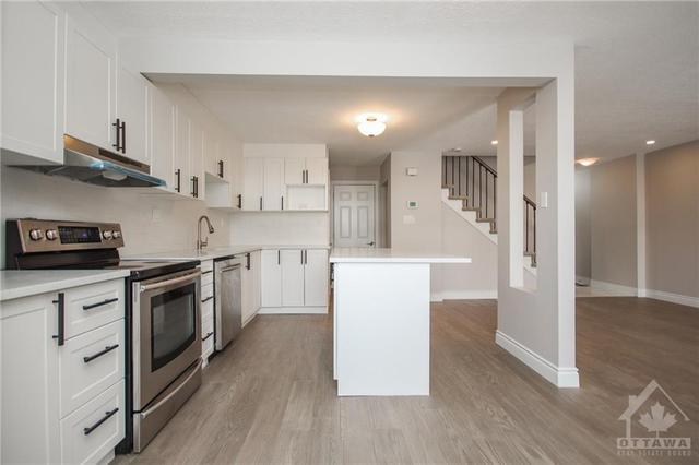 17 Estelle Crescent, Townhouse with 3 bedrooms, 3 bathrooms and 6 parking in Ottawa ON | Image 3