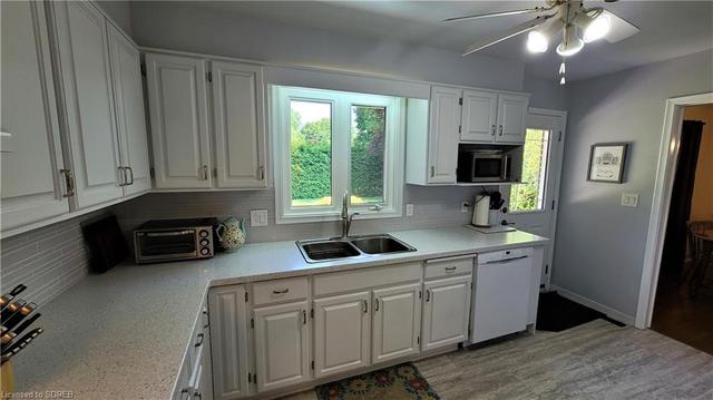 Updated Kitchen with tons of cabinets, pantry and access to the rear yard | Image 6