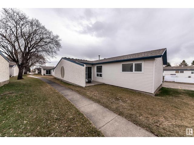 1093 Millbourne Rd E Nw, House attached with 3 bedrooms, 1 bathrooms and 2 parking in Edmonton AB | Image 2