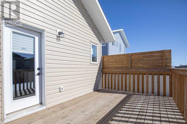 21 Panorama Avenue, House detached with 3 bedrooms, 2 bathrooms and 2 parking in Lacombe AB | Image 27