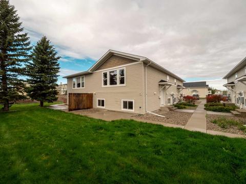 2 - 24 Cougar Cove N, Home with 3 bedrooms, 1 bathrooms and 1 parking in Lethbridge AB | Card Image