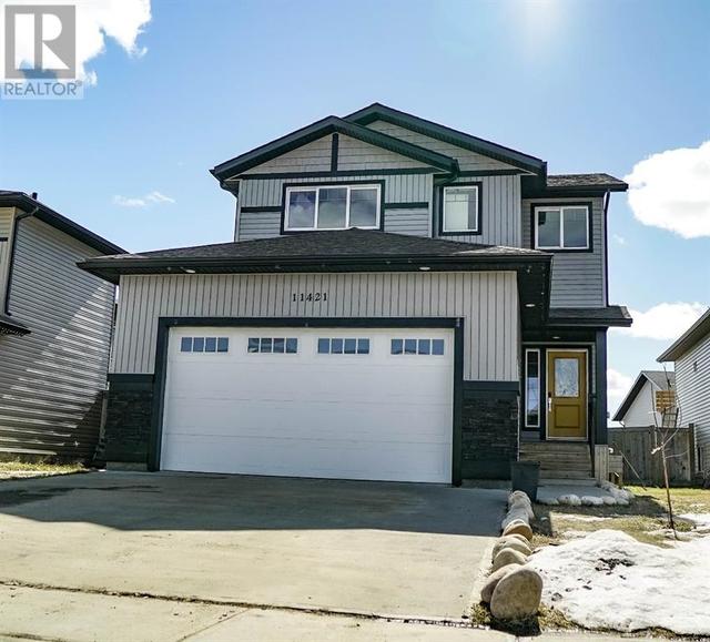 11421 73 Avenue, House detached with 4 bedrooms, 3 bathrooms and 2 parking in Grande Prairie AB | Card Image