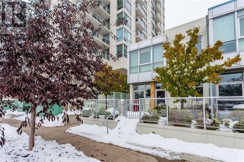 132, - 99 Spruce Place Sw, House attached with 2 bedrooms, 2 bathrooms and 2 parking in Calgary AB | Card Image