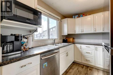 302, - 5340 17 Avenue Sw, House attached with 3 bedrooms, 1 bathrooms and 2 parking in Calgary AB | Card Image