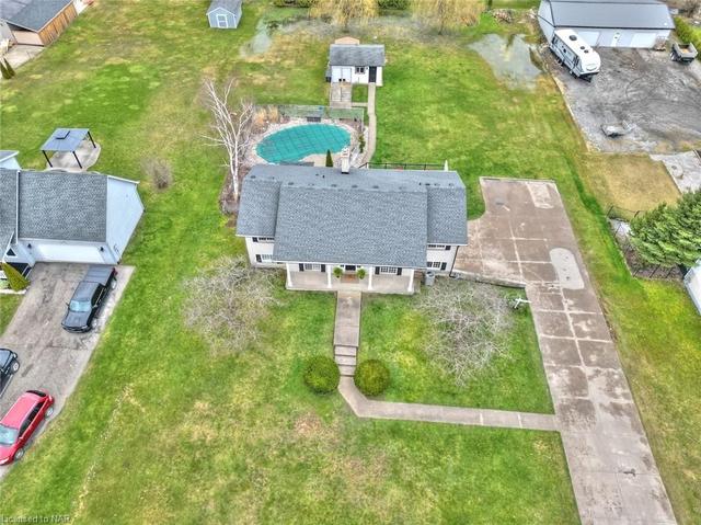 overhead shot of front elevation - note large concrete driveway | Image 38