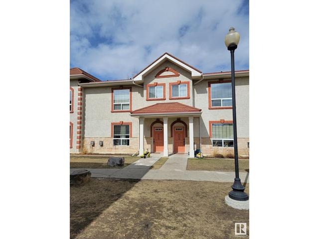 112 - 13825 155 Av Nw Nw, House attached with 2 bedrooms, 2 bathrooms and 2 parking in Edmonton AB | Image 1