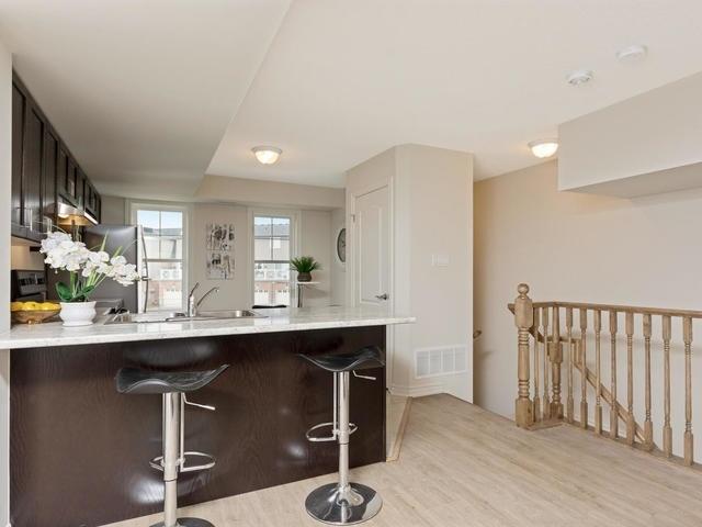 118 - 1380 Costigan Rd, Townhouse with 2 bedrooms, 3 bathrooms and 1 parking in Milton ON | Image 3