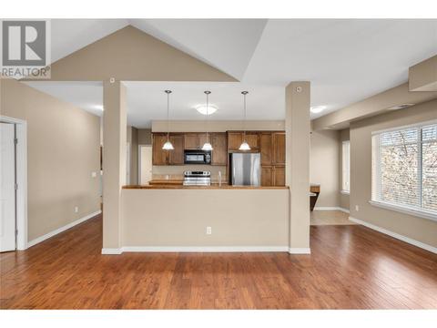 402 - 1007 Harvey Avenue, Condo with 3 bedrooms, 2 bathrooms and 2 parking in Kelowna BC | Card Image
