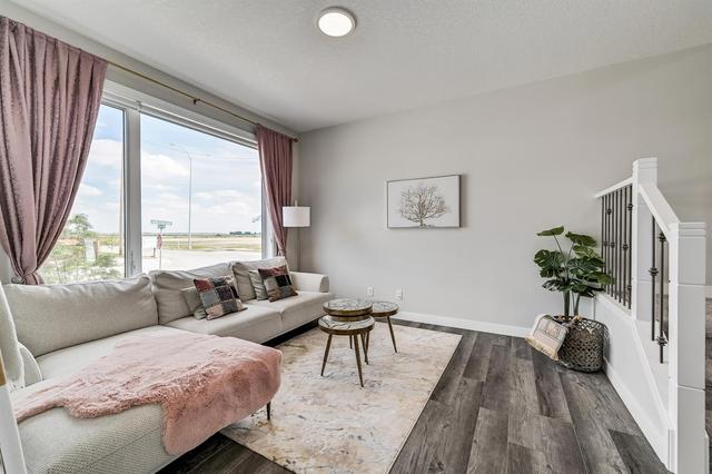 13 Homestead Boulevard Ne, Home with 4 bedrooms, 3 bathrooms and 2 parking in Calgary AB | Image 4