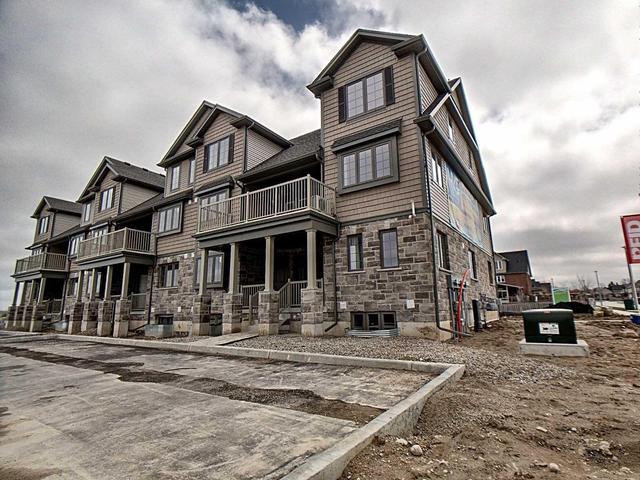 1A - 85 Mullin Dr, Townhouse with 0 bedrooms, 2 bathrooms and 1 parking in Guelph ON | Image 2
