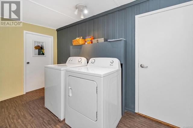 LAUNDRY ROOM, EXIT TO BACKYARD | Image 23