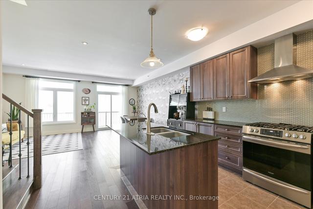 3932 Highway 7 E, House attached with 4 bedrooms, 5 bathrooms and 4 parking in Markham ON | Image 3