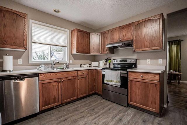 9011 64 Avenue, Home with 4 bedrooms, 2 bathrooms and 2 parking in Grande Prairie AB | Image 22
