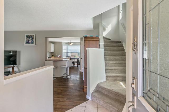 249 Banister Drive, House semidetached with 3 bedrooms, 2 bathrooms and 2 parking in Okotoks AB | Card Image