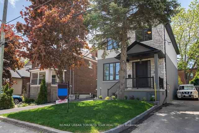 26 Kalmar Ave, House detached with 4 bedrooms, 4 bathrooms and 3 parking in Toronto ON | Image 1