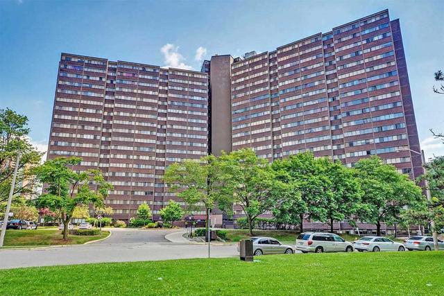 412 - 11 Wincott Dr, Condo with 3 bedrooms, 2 bathrooms and 2 parking in Toronto ON | Image 1