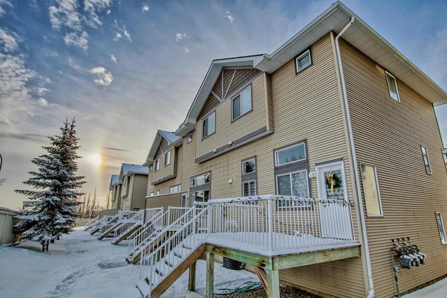 80 Crystal Shores Cove, Home with 3 bedrooms, 2 bathrooms and 2 parking in Calgary AB | Image 3