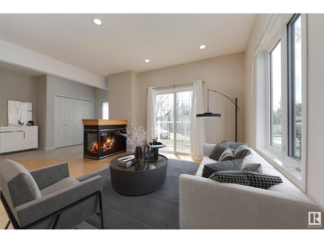 8206 103 Av Nw, House attached with 3 bedrooms, 2 bathrooms and null parking in Edmonton AB | Image 2