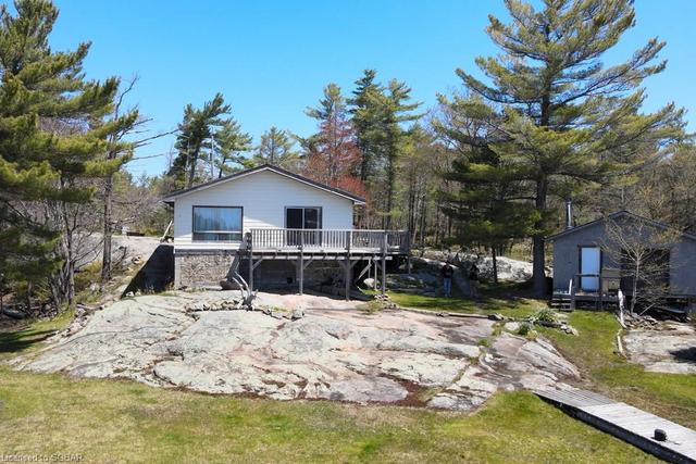 27142 Georgian Bay Shore, House detached with 3 bedrooms, 1 bathrooms and null parking in Georgian Bay ON | Image 5