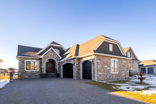 1811 Bayside Island Sw, House detached with 4 bedrooms, 4 bathrooms and 6 parking in Airdrie AB | Image 1