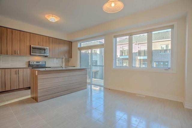 11 Augustus Terr, Townhouse with 3 bedrooms, 4 bathrooms and 2 parking in Toronto ON | Image 3