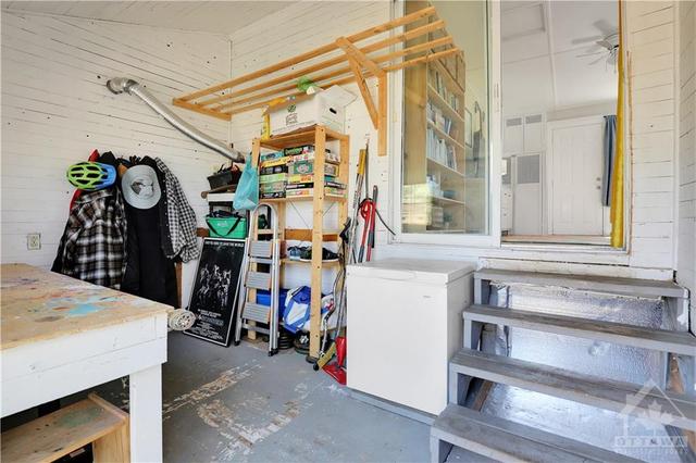 Moving back downstairs and heading into the back yard we find the mudroom. Or hobby area storage, you name it. It is a flex area ready for you. | Image 22