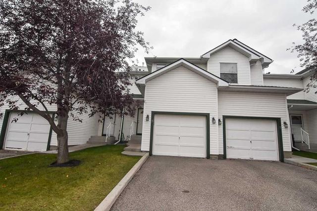 5 Sandpiper Link Nw, Home with 3 bedrooms, 1 bathrooms and 2 parking in Calgary AB | Image 3