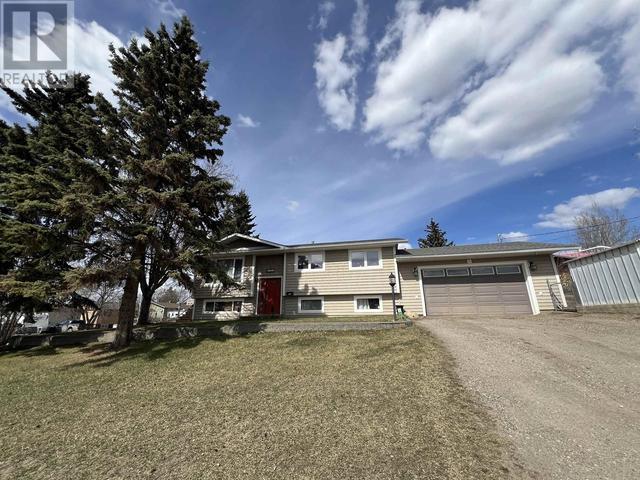 8716 91 Avenue, House detached with 4 bedrooms, 3 bathrooms and null parking in Fort St. John BC | Image 1