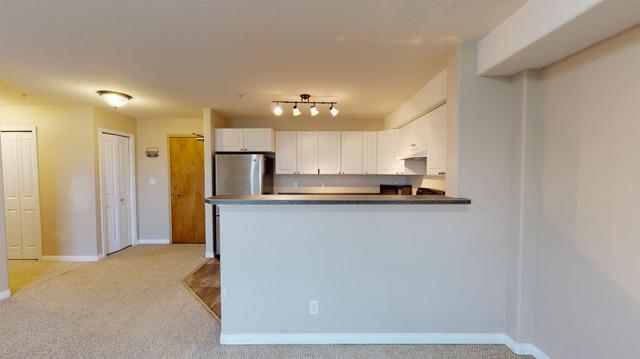 215 - 248a Grosbeak Way, Condo with 2 bedrooms, 1 bathrooms and 1 parking in Wood Buffalo AB | Image 2