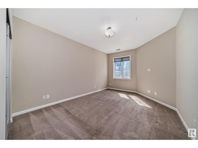 310 - 6083 Maynard Wy Nw, Condo with 1 bedrooms, 1 bathrooms and 2 parking in Edmonton AB | Image 23
