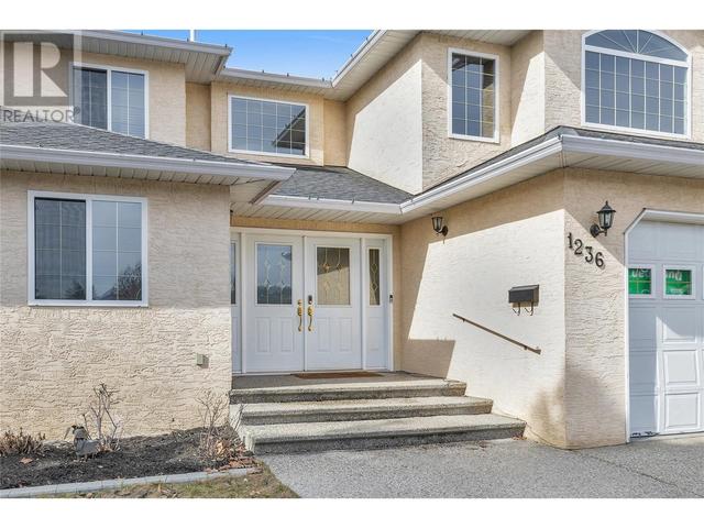 1236 Cerise Drive, House detached with 4 bedrooms, 3 bathrooms and 4 parking in Kelowna BC | Image 1