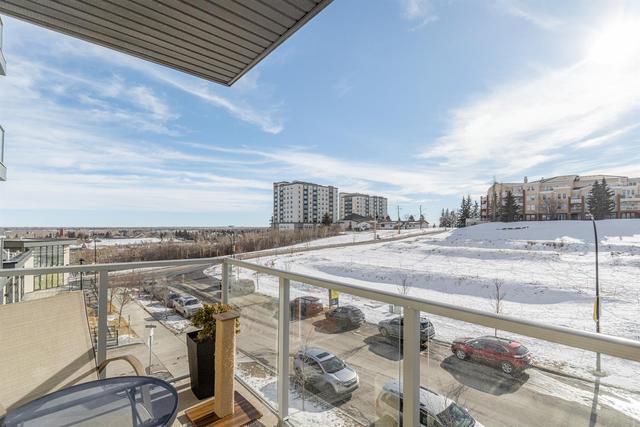 304 - 71 Shawnee Common Sw, Condo with 2 bedrooms, 2 bathrooms and 1 parking in Calgary AB | Image 25