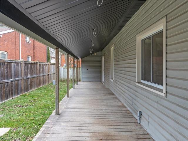 Wrap around covered porch on East side of house | Image 45