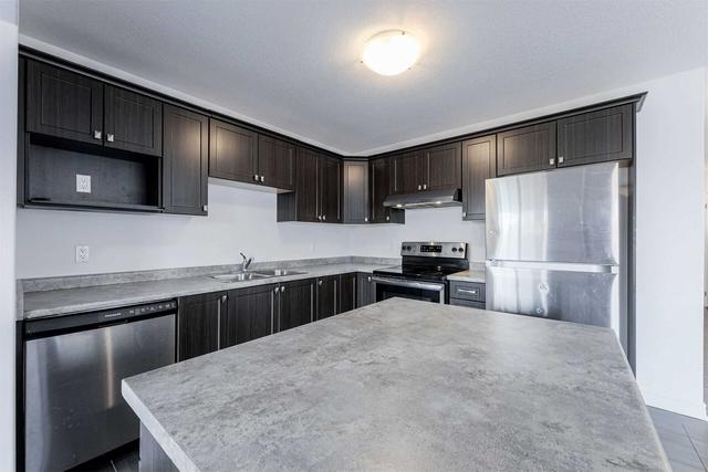 65 - 124 Parkinson Cres, House attached with 3 bedrooms, 3 bathrooms and 2 parking in Orangeville ON | Image 7