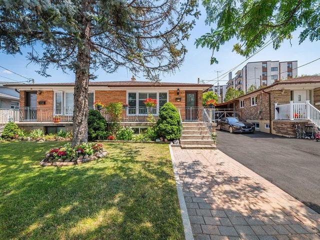 9 Cherrylawn Ave, House semidetached with 3 bedrooms, 2 bathrooms and 5 parking in Toronto ON | Card Image