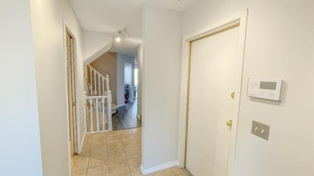 316 Coachway Lane Sw, Home with 3 bedrooms, 2 bathrooms and 2 parking in Calgary AB | Image 2