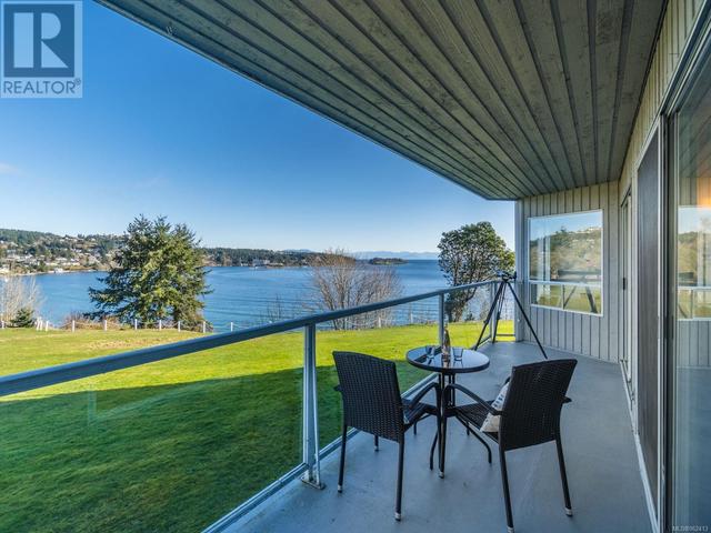 205 - 2560 Departure Bay Rd, Condo with 2 bedrooms, 2 bathrooms and 2 parking in Nanaimo BC | Image 1