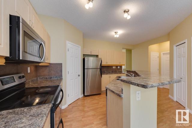 54 - 1650 Towne Centre Bv Nw, House attached with 2 bedrooms, 2 bathrooms and 2 parking in Edmonton AB | Image 21